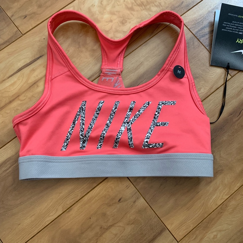 A super cute pink kids Nike sports bra